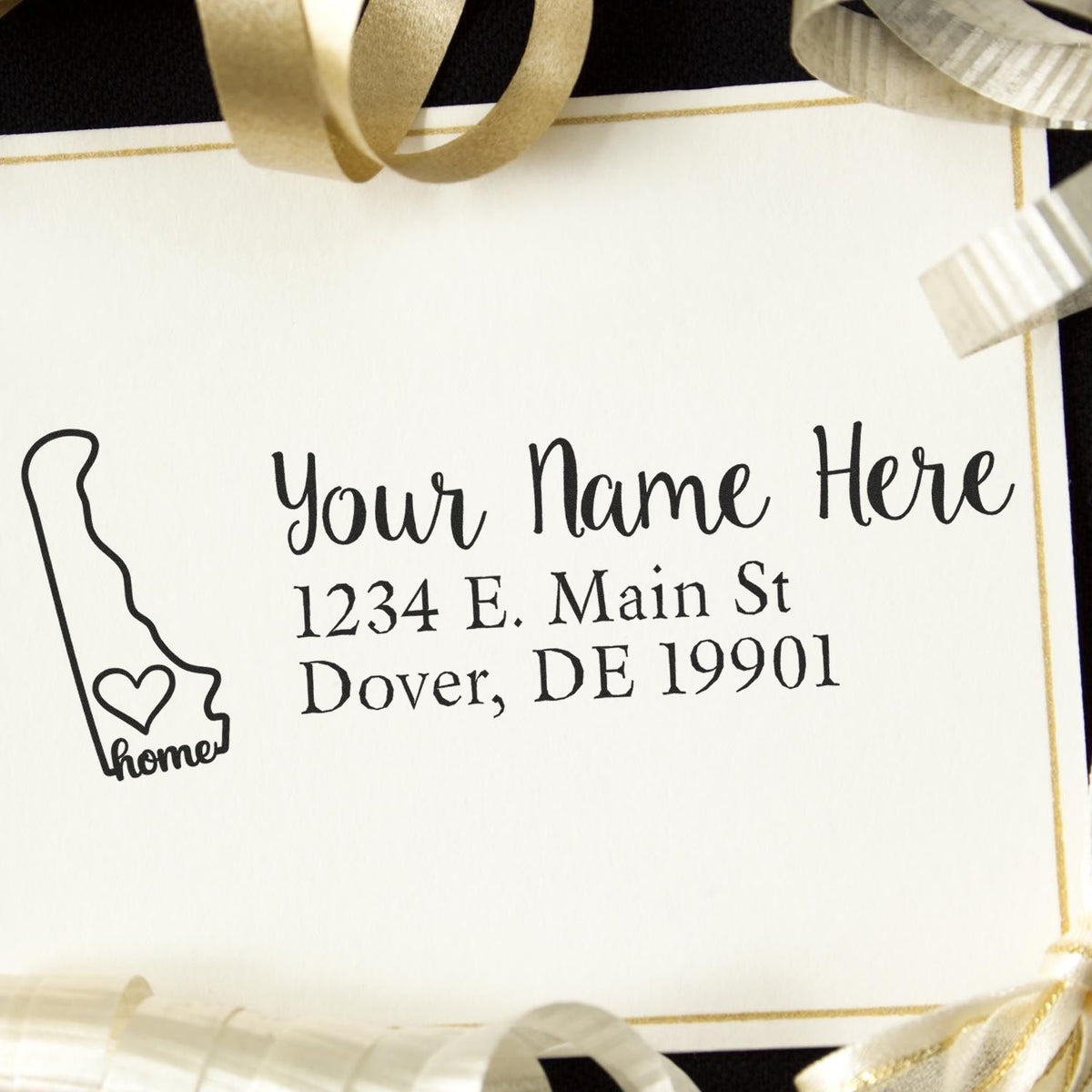 Custom Delaware address rubber stamp with home icon and personalized name, street address, and ZIP code.