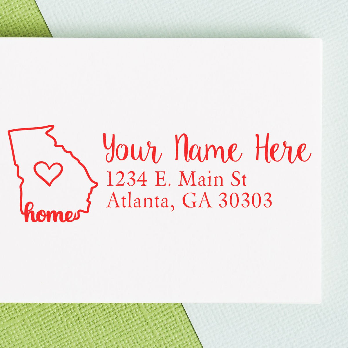 Custom Georgia return address rubber stamp with home icon, personalized name, and Atlanta, GA address.