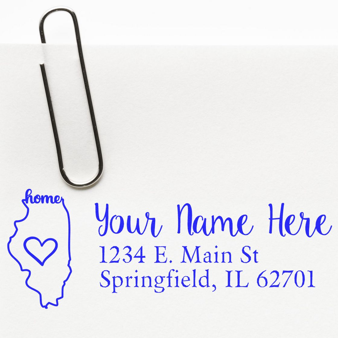 Custom return address rubber stamp with Illinois outline and heart for personalized mailing, featuring sample name and Springfield address.