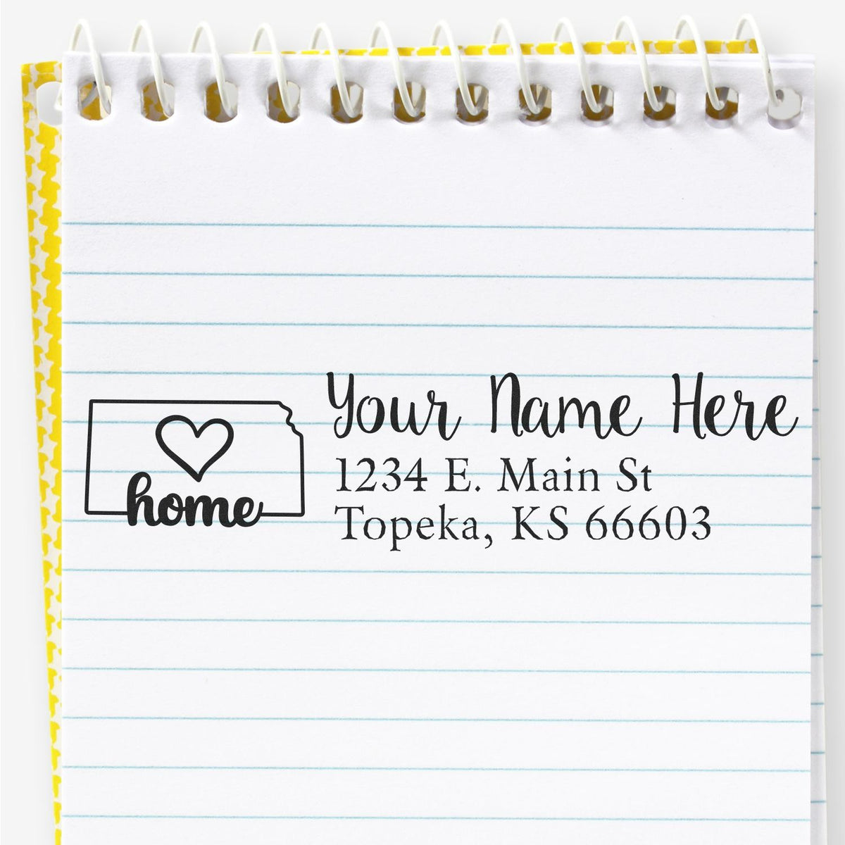 Personalized home address rubber stamp with heart and house icon, showing custom name and mailing address.
