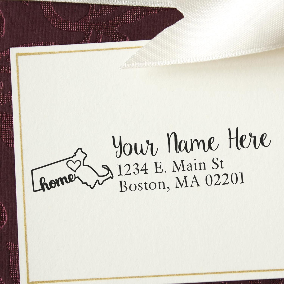 Custom return address rubber stamp with name, Boston MA address and Massachusetts home-state outline for envelopes.