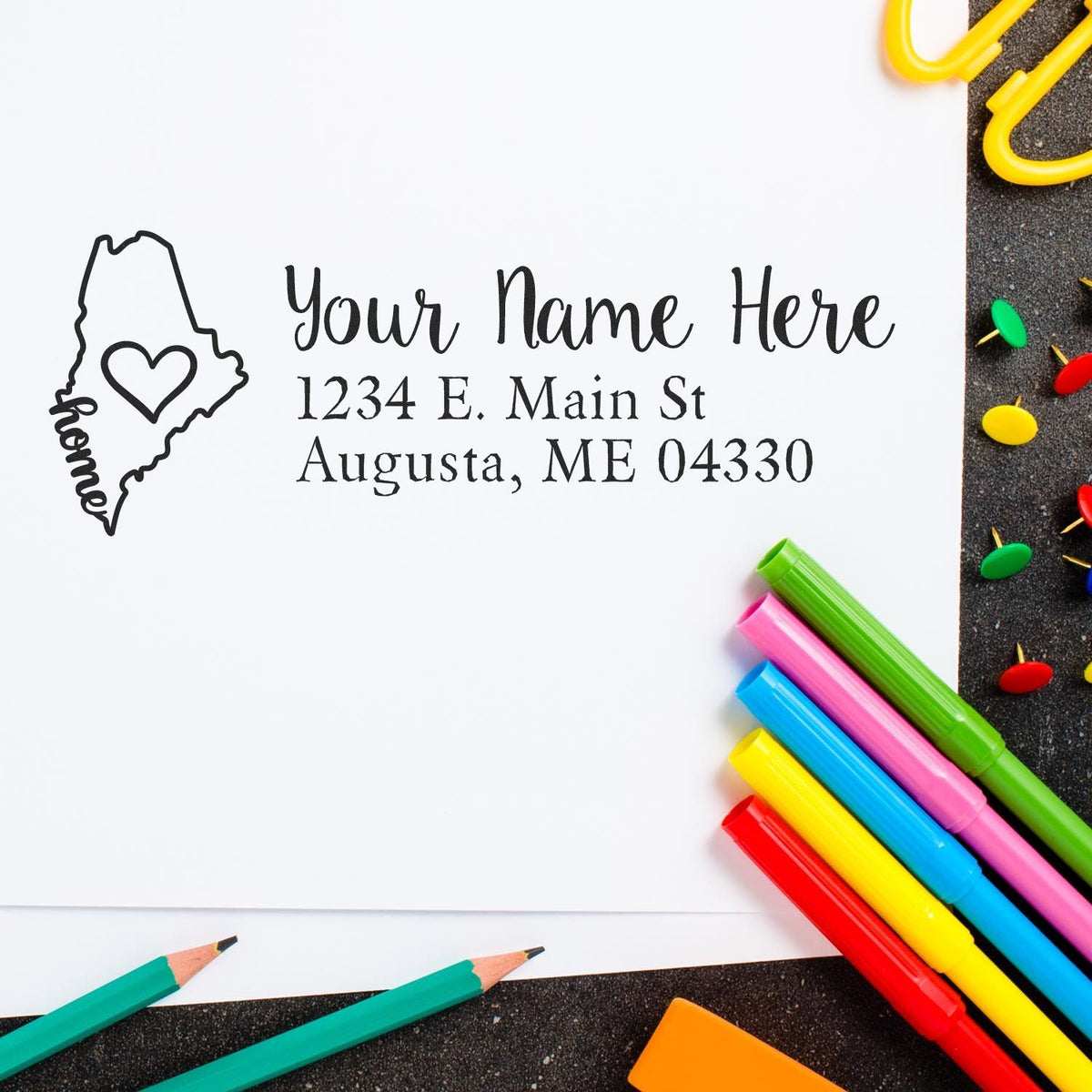 Custom Maine return address rubber stamp with heart state design, name, and address for personalized mailing and stationery.