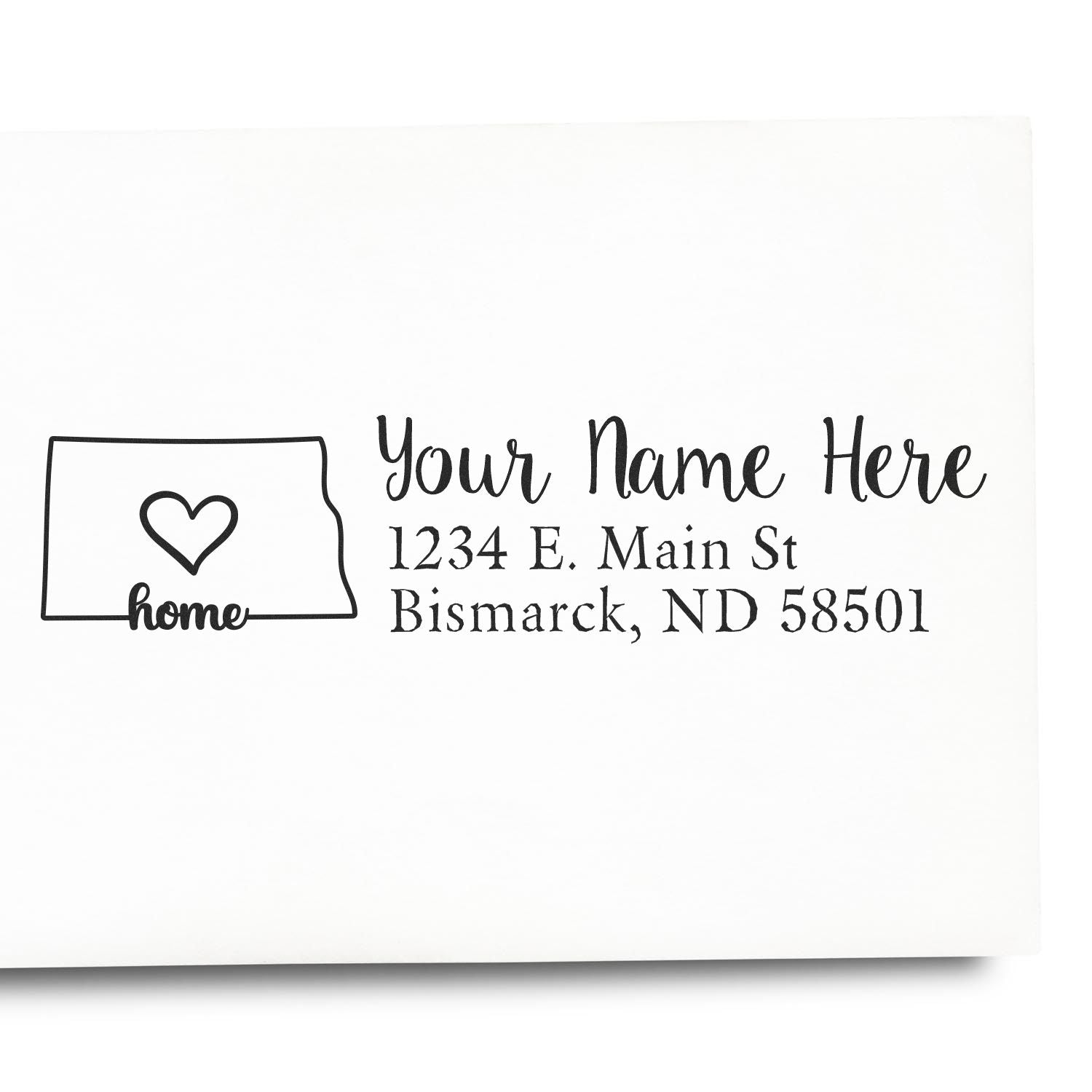 Custom return address rubber stamp with home icon and sample Bismarck, ND address for personalized envelopes.