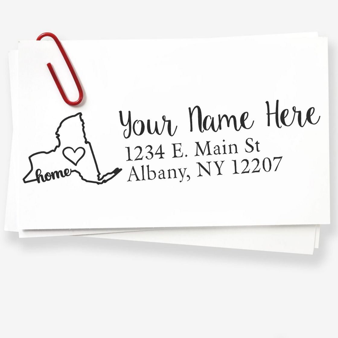 Personalized custom address rubber stamp with New York home design, name, and return address for mailing.