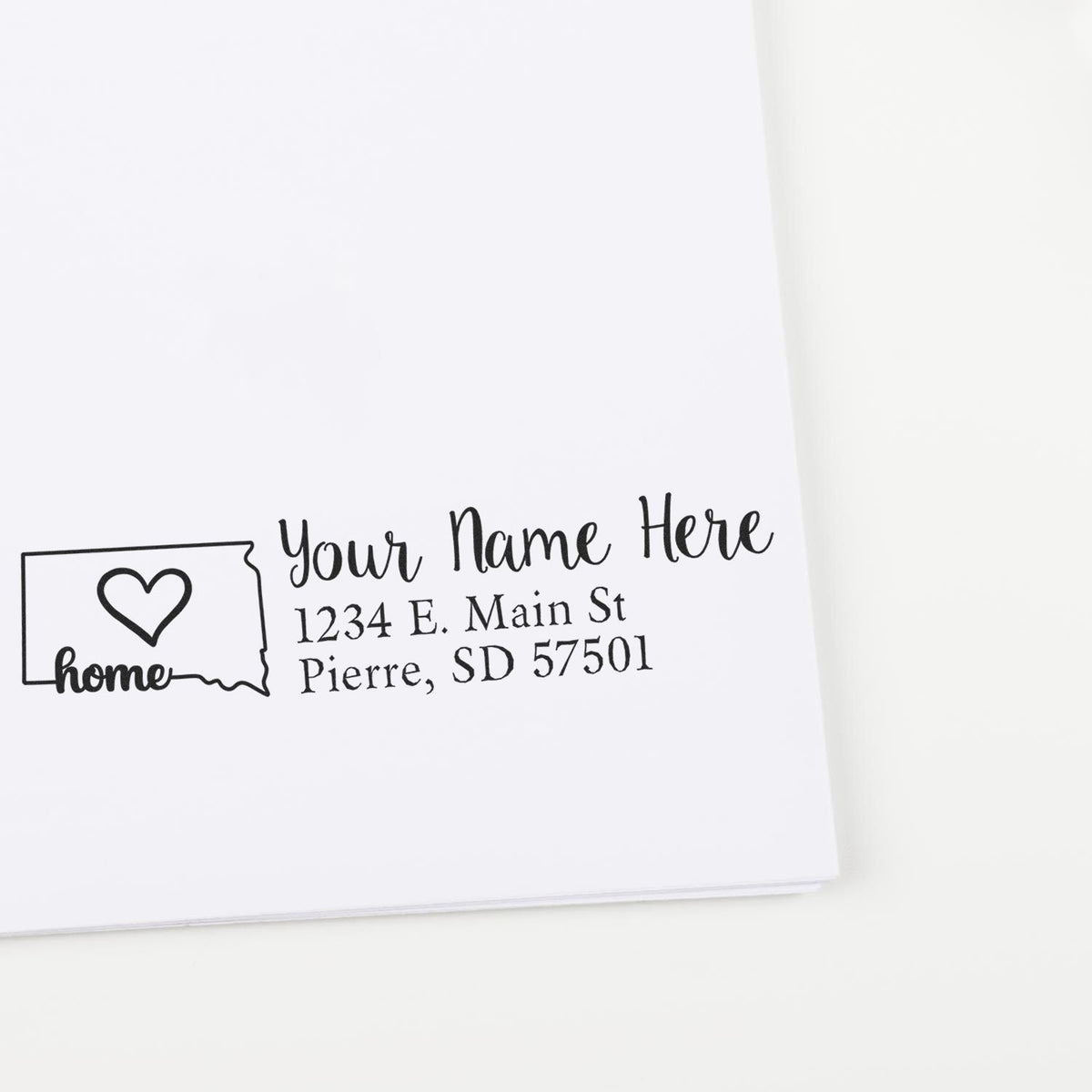 Personalized return address rubber stamp with home and heart design for envelopes, cards, and stationery.