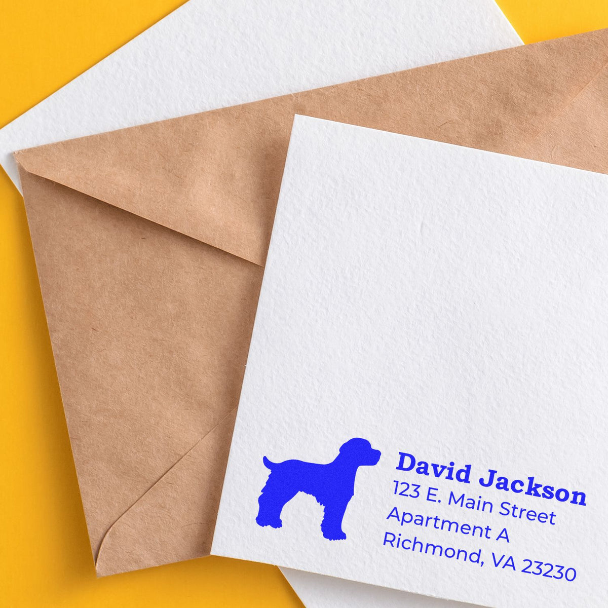 Custom dog address rubber stamp on envelope and stationery for pet-themed return address labeling.