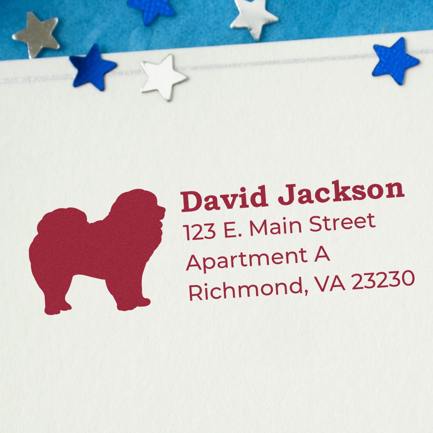 Custom rubber stamp with dog silhouette and return address for pet-themed stationery and mail.