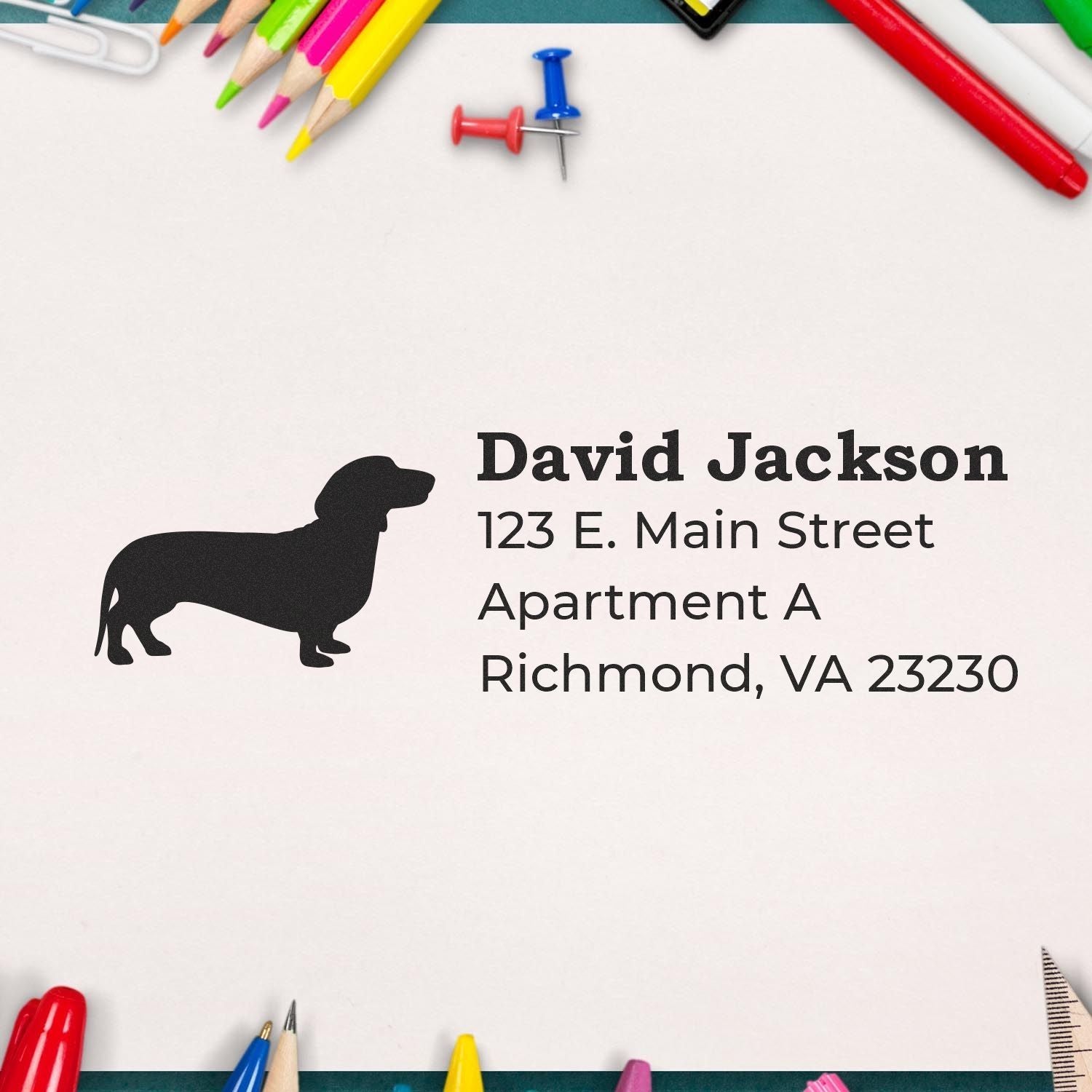 Custom dachshund return address rubber stamp with name, street address, and apartment number for envelopes.