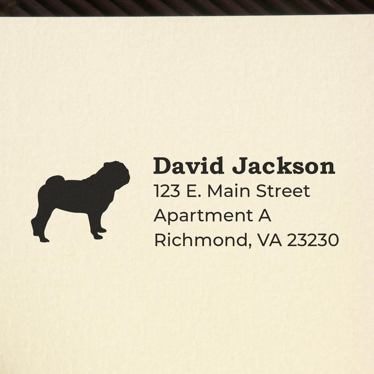 Custom address rubber stamp with dog silhouette for David Jackson, 123 E. Main Street, Apartment A, Richmond, VA 23230.