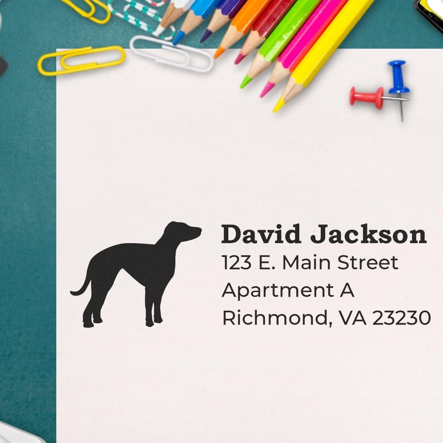 Personalized address rubber stamp with dog silhouette, featuring custom mailing details for pet lovers and business branding.