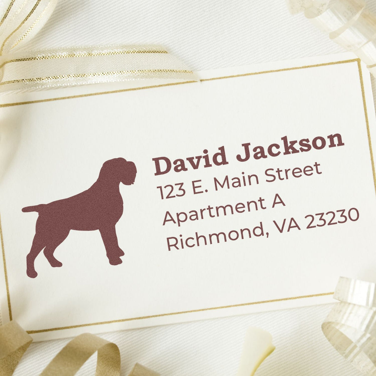 Personalized dog return address rubber stamp with name, street address, and city for custom stationery.