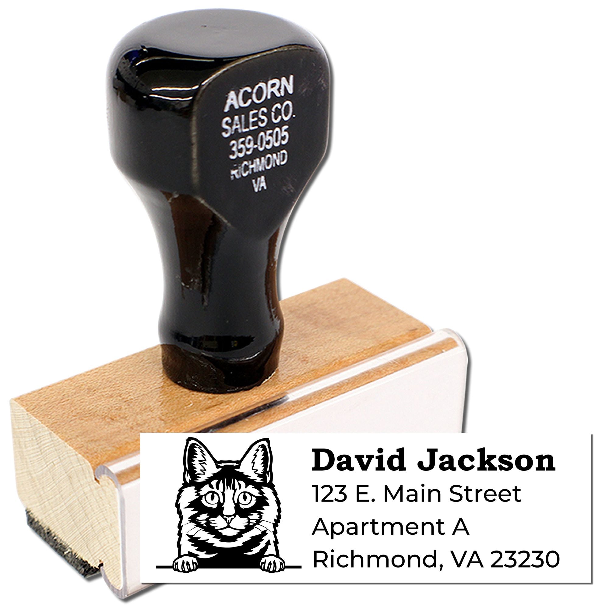 Custom rubber address stamp with cat design and sample name and address imprint for personalized mailing.