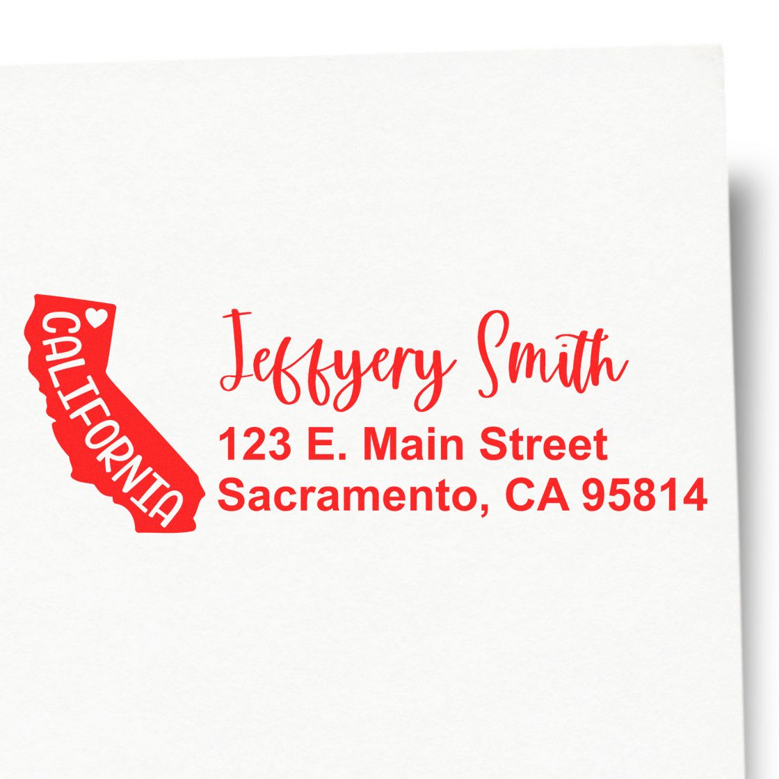 Custom California return address rubber stamp for Jeffrey Smith, 123 E. Main Street, Sacramento, CA 95814.