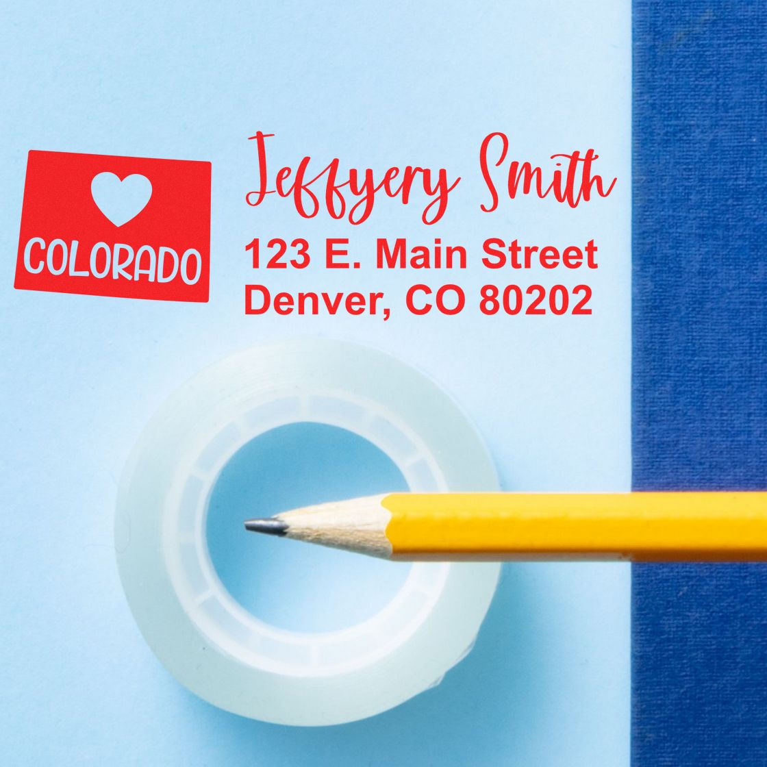 Custom rubber stamp for return address with Colorado heart design, personalized name, and Denver, CO mailing address.