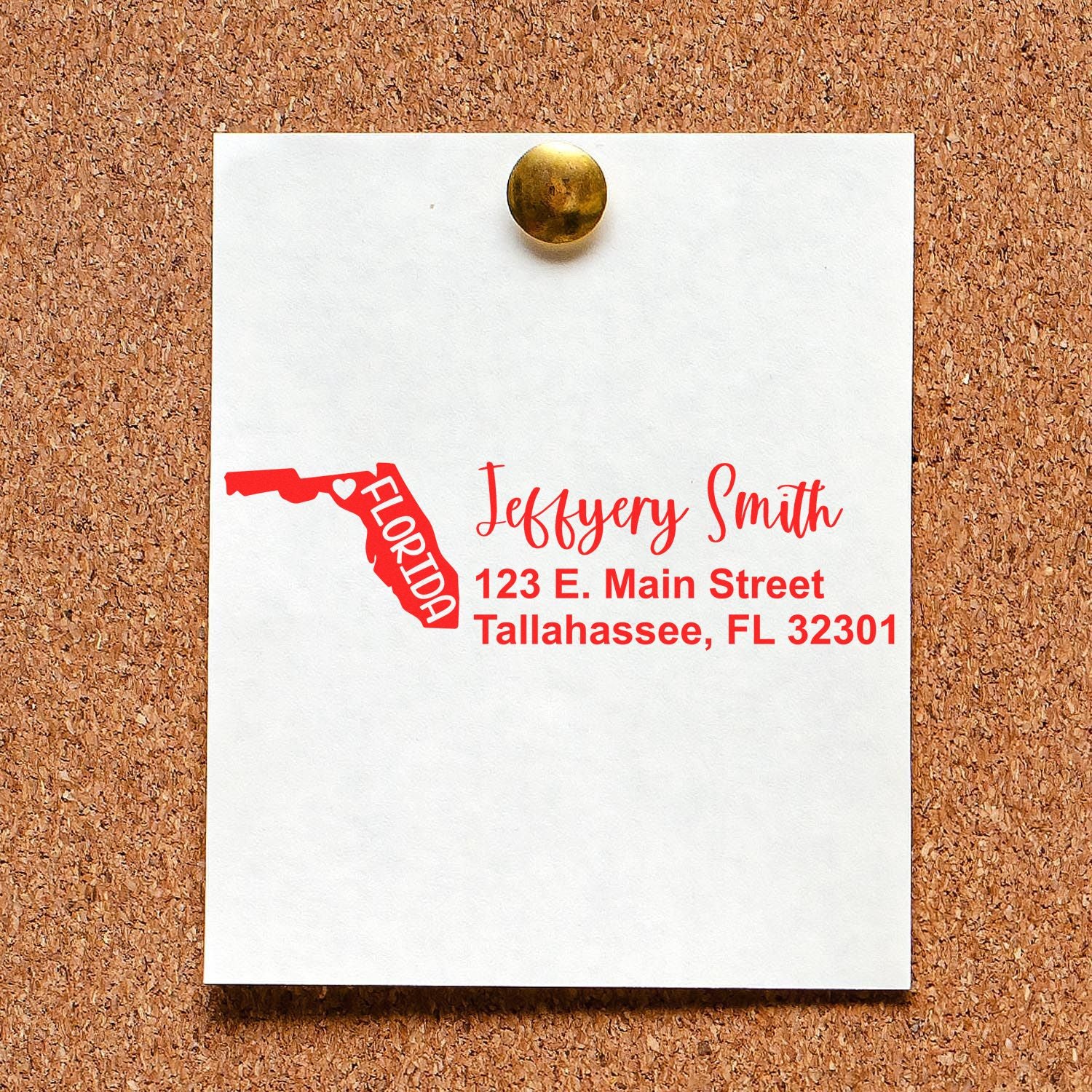 Custom Florida-shaped return address rubber stamp with name and Tallahassee mailing address on a paper sample.