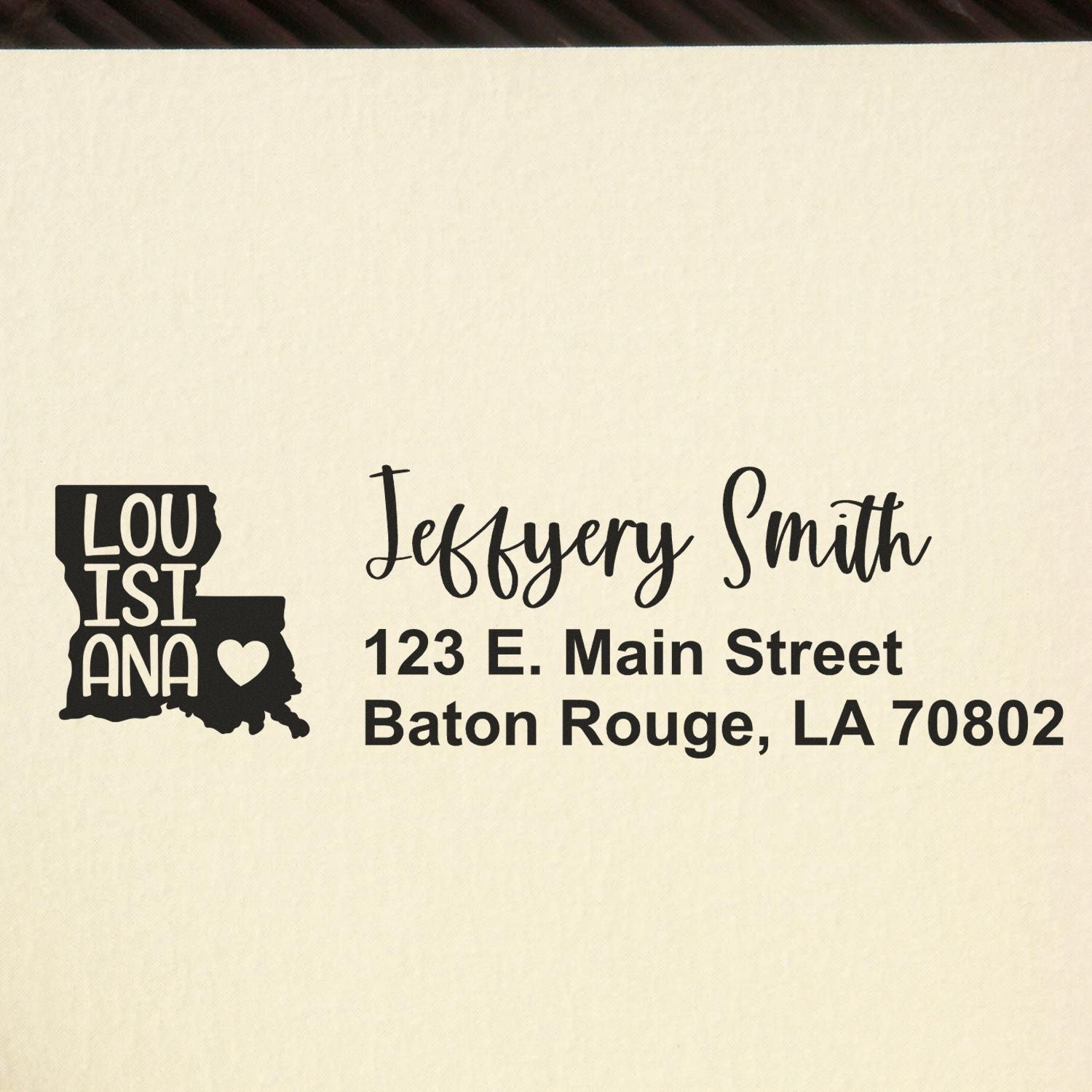 Custom Louisiana state-shaped return address rubber stamp for Jeffrey Smith, Baton Rouge, LA 70802.