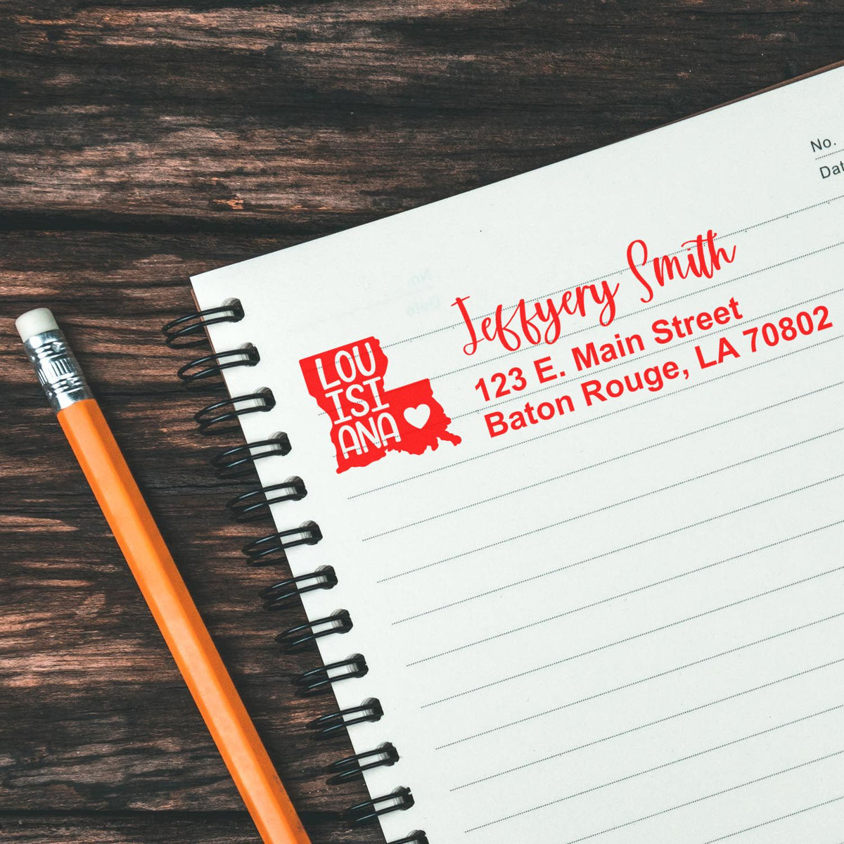 Custom Louisiana address rubber stamp impression on notebook paper for personalized mailing, branding, and business stationery.