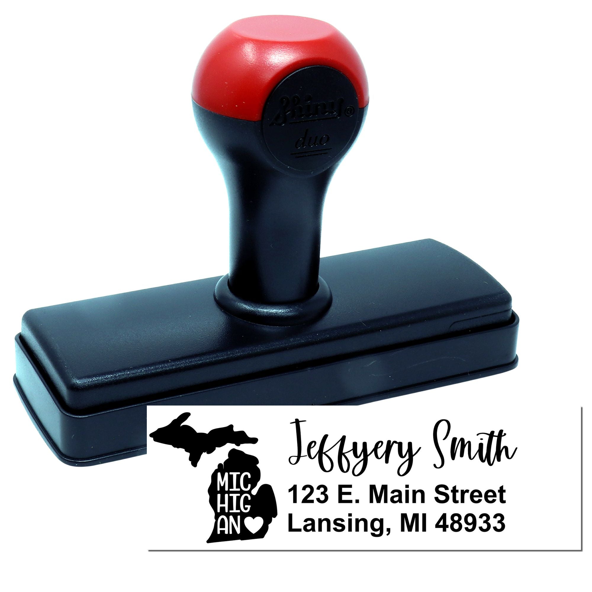 Custom self-inking rubber address stamp with Michigan return address design for envelopes, business mail, and personalized stationery.