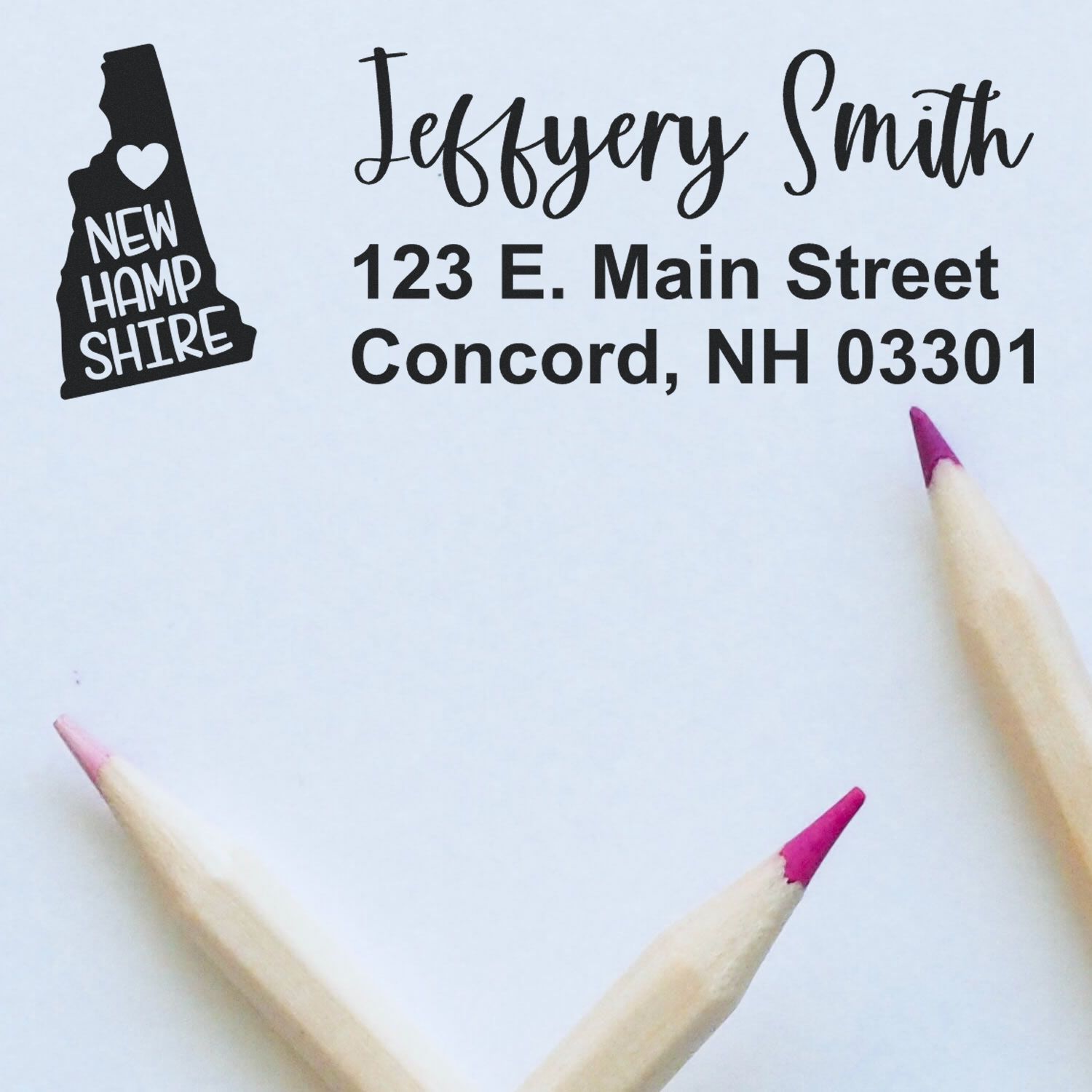 Custom address rubber stamp with New Hampshire state design, name, and Concord NH return address.