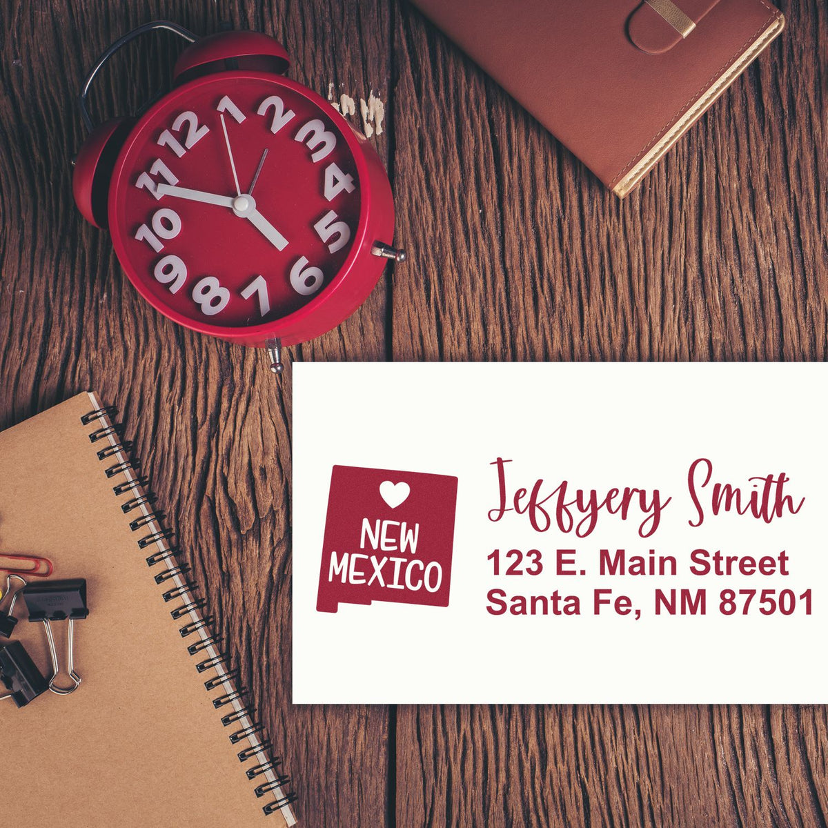 Custom return address rubber stamp for Jeffrey Smith with New Mexico icon and Santa Fe, NM mailing address.