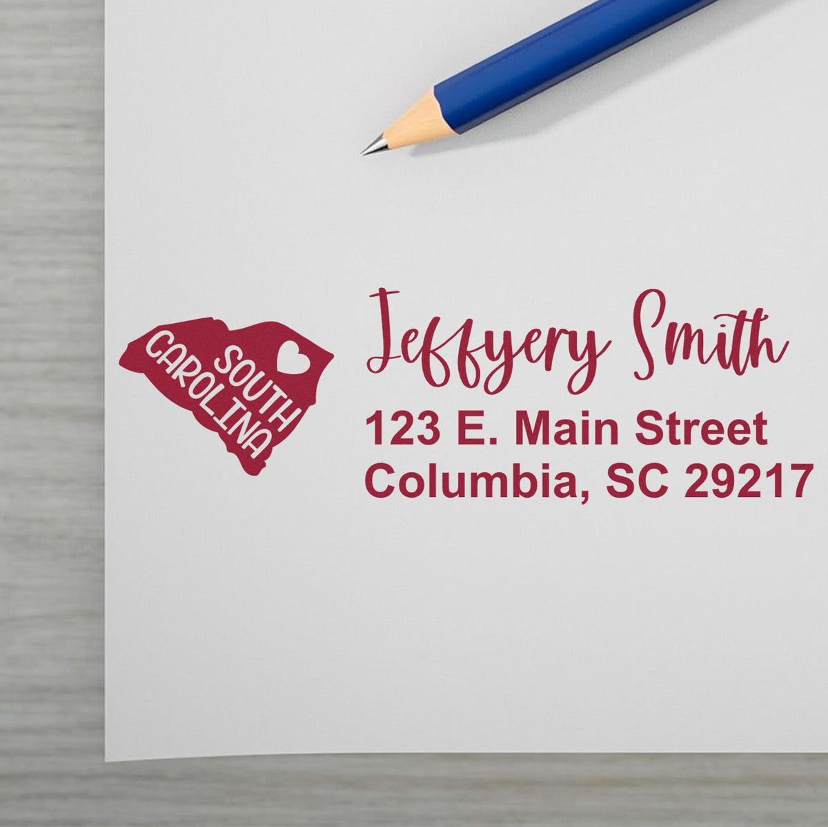 Custom return address rubber stamp with South Carolina state design, name, and Columbia, SC address sample.