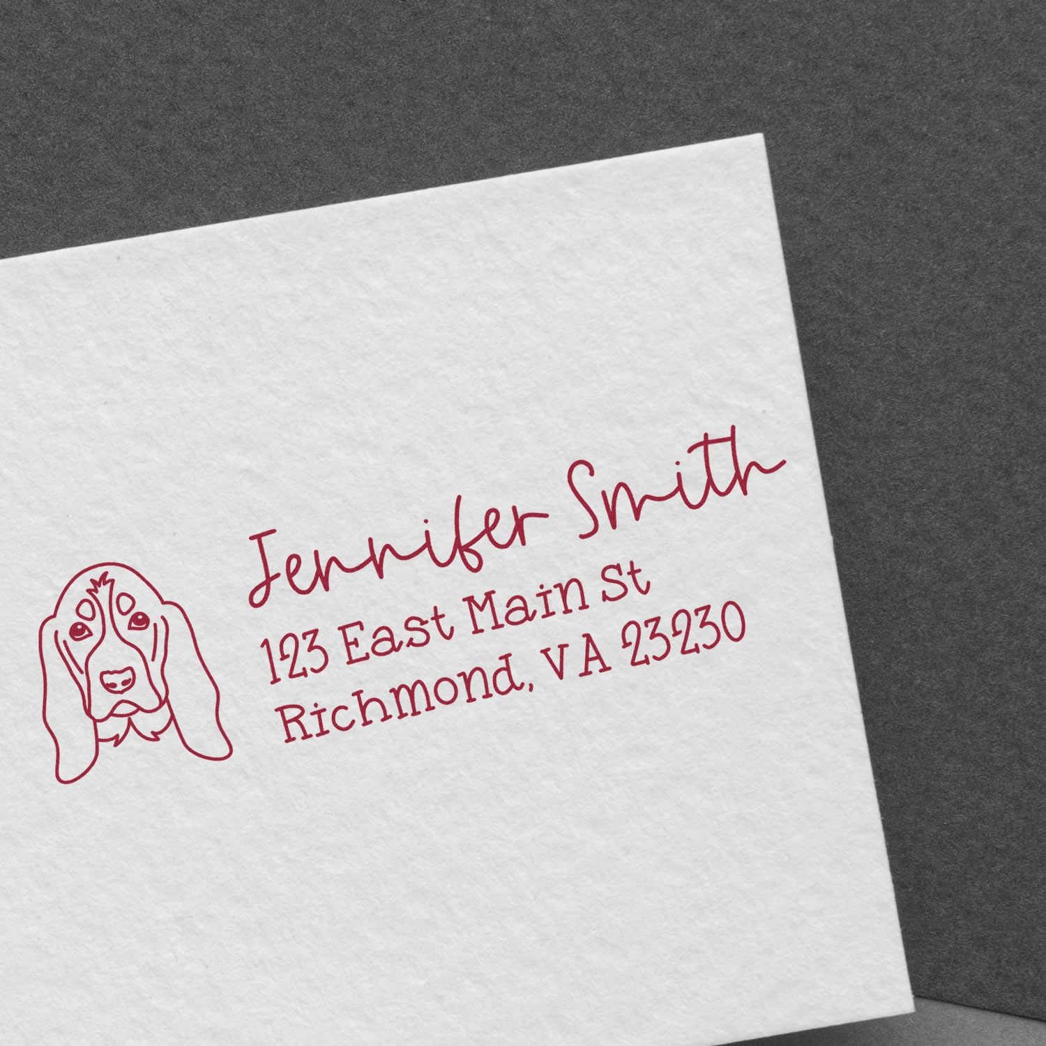 Custom rubber stamp with dog illustration and return address for Jennifer Smith, Richmond, VA.