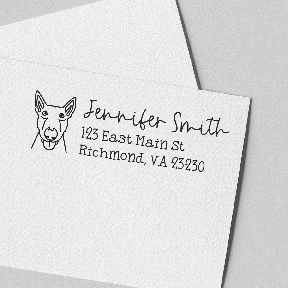 Personalized rubber stamp return address with dog illustration for Jennifer Smith, Richmond, VA 23230.