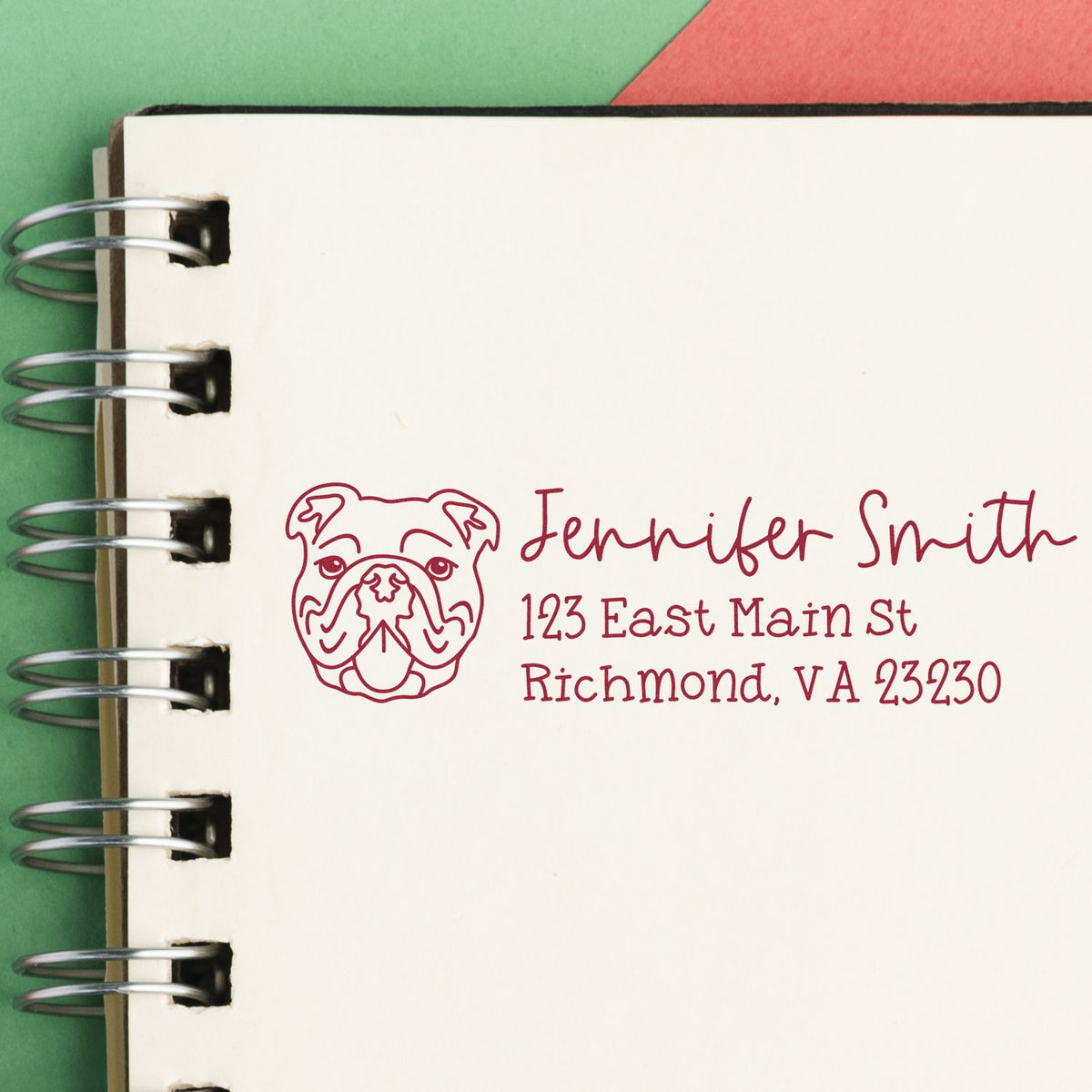 Custom bulldog return address rubber stamp with name and Richmond, VA address on a notebook page.