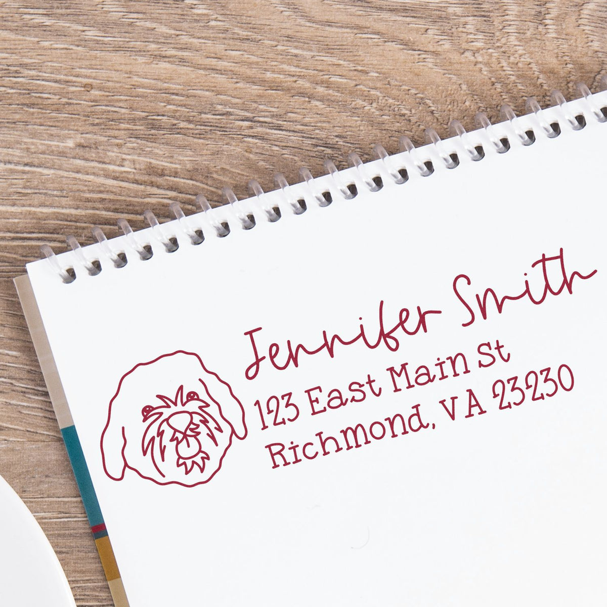 Custom rubber address stamp with dog logo, Jennifer Smith return address, Richmond VA 23230, for personalized mailing.