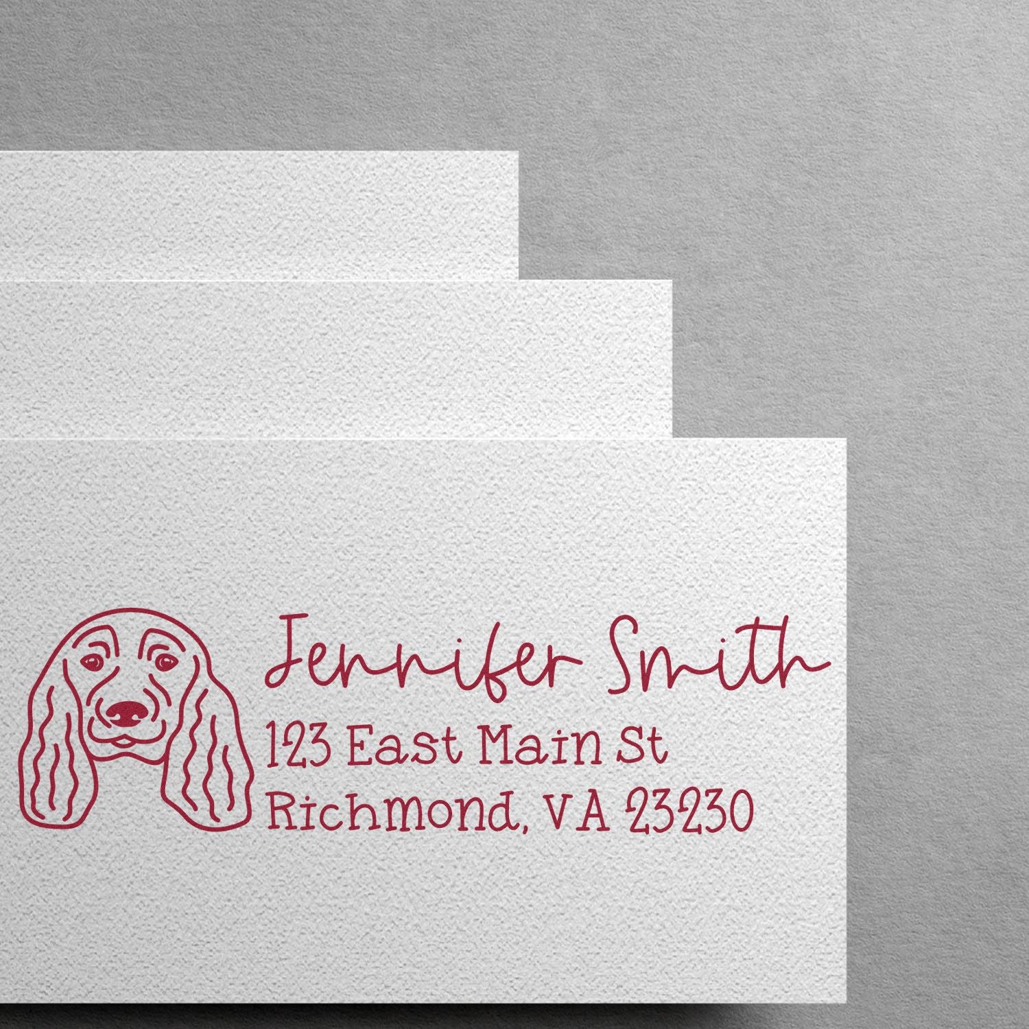 Custom return address rubber stamp with dog illustration for Jennifer Smith, Richmond, VA.