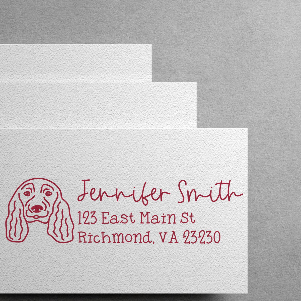 Personalized dog return address rubber stamp with name, street address, and Richmond, VA in red ink.