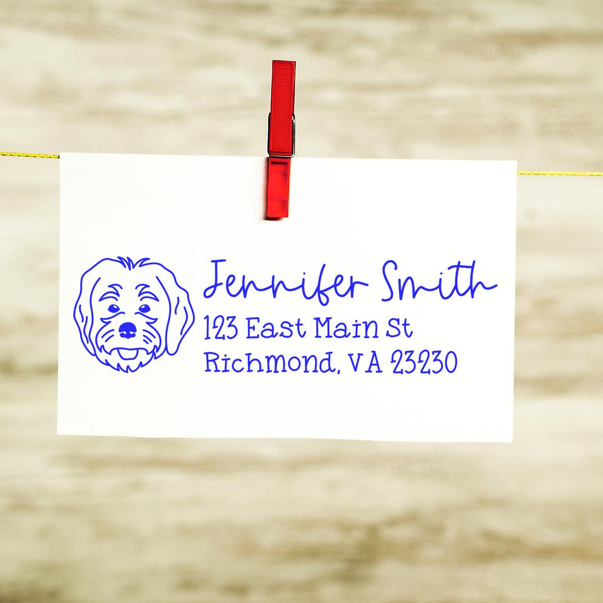 Custom dog address rubber stamp with Jennifer Smith name and Richmond, VA return address on paper