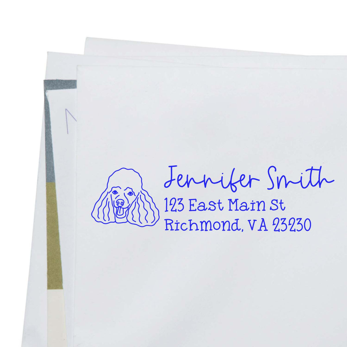 Custom return address rubber stamp with poodle icon, name, and Richmond, VA address for envelopes and stationery.