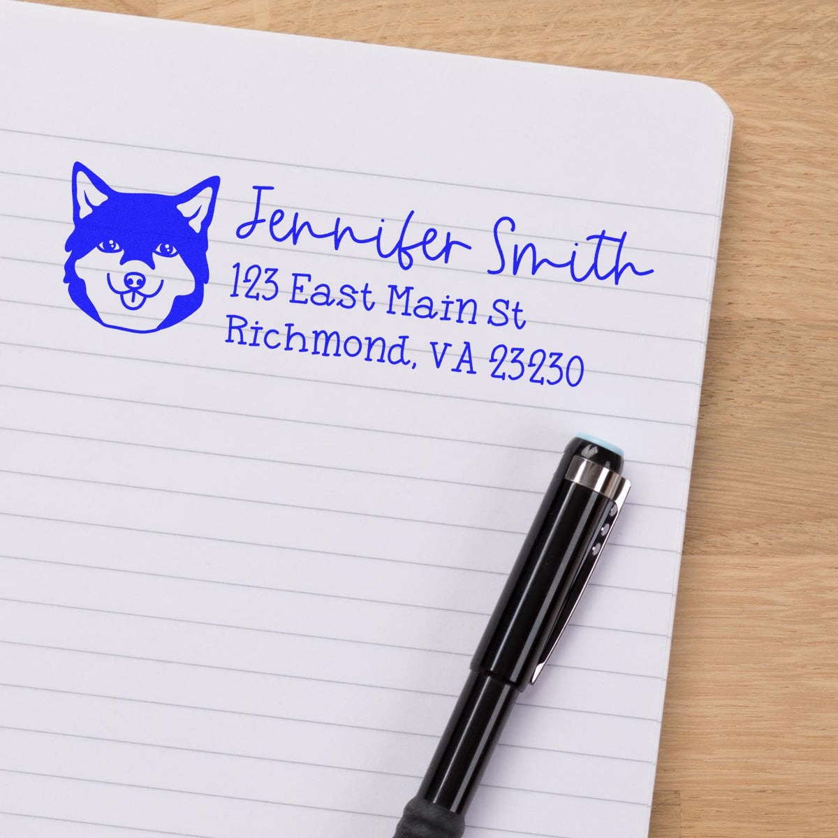 Custom self-inking return address rubber stamp with husky icon for Jennifer Smith, Richmond, VA.