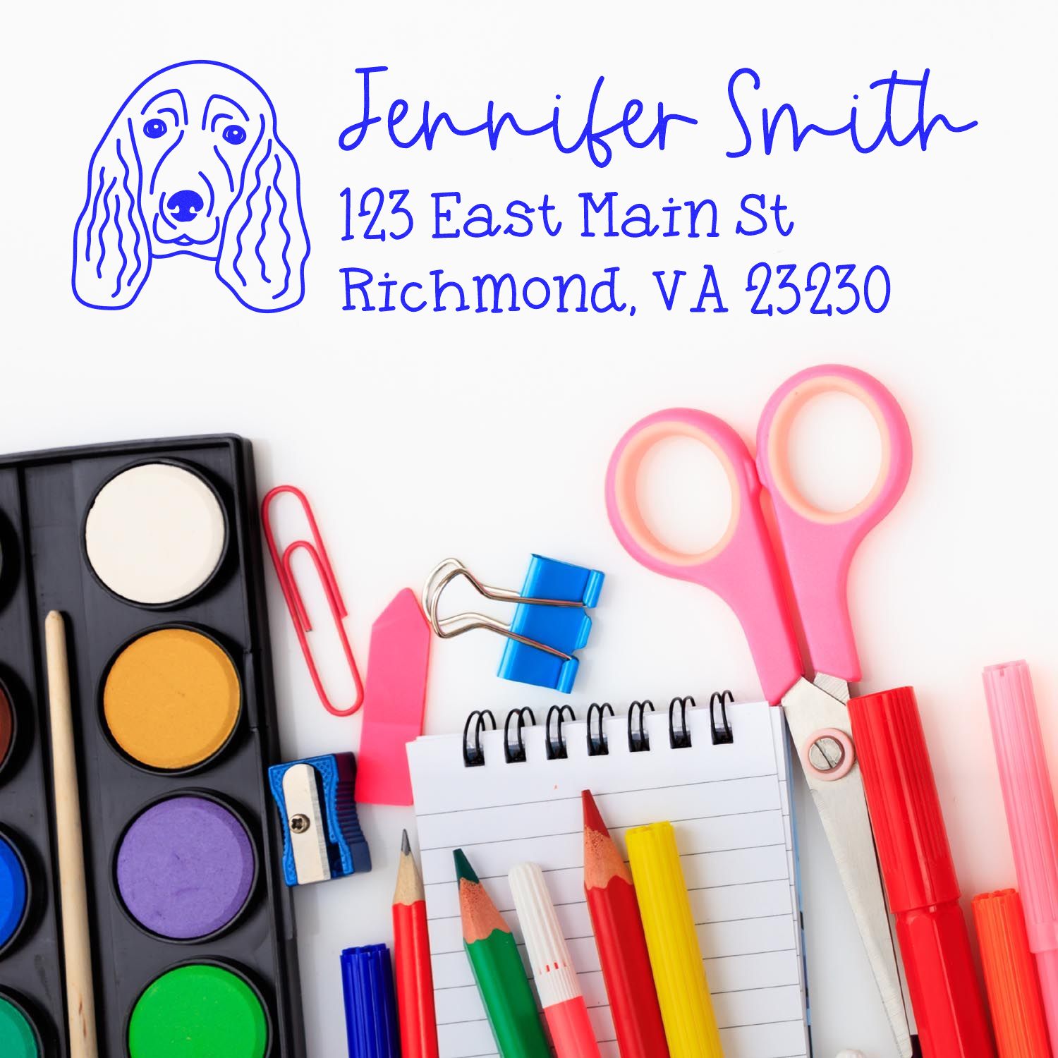 Custom dog address rubber stamp with pet illustration, name, and return address for personalized stationery and mailings.