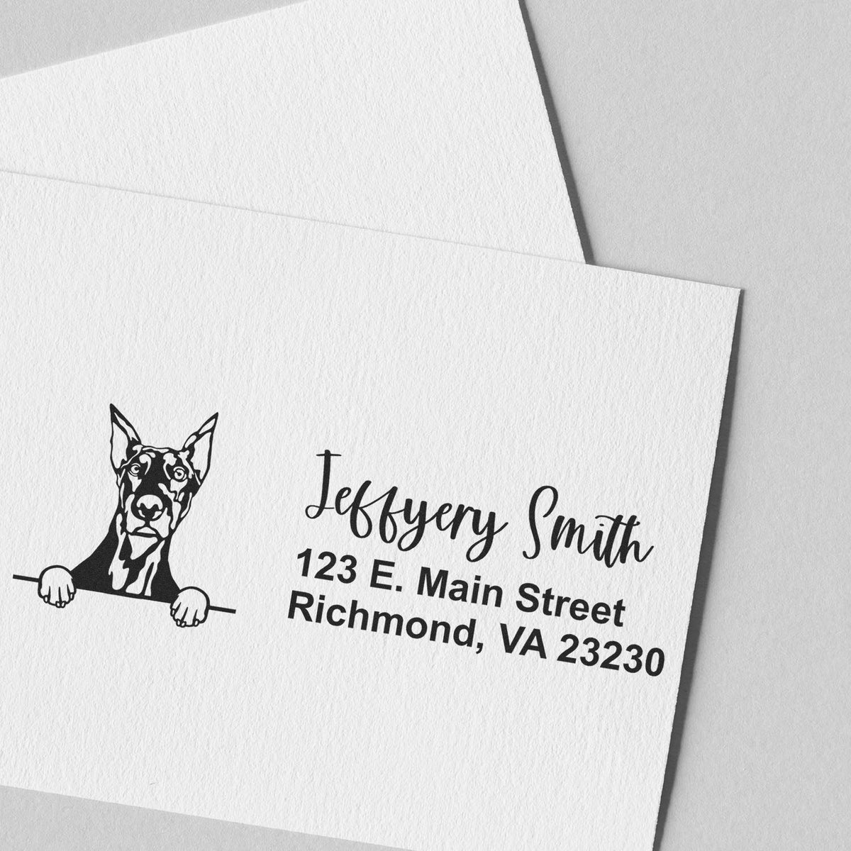 Custom rubber stamp return address on envelope with dog illustration, Jeffery Smith, and Richmond, VA address.