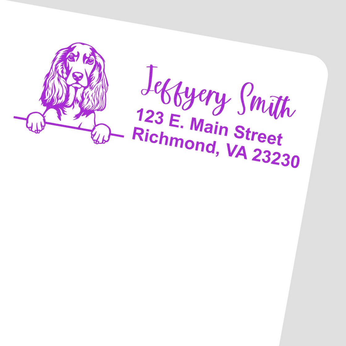 Custom dog address rubber stamp with cocker spaniel illustration, name, street address, and Richmond, VA 23230 in purple ink.