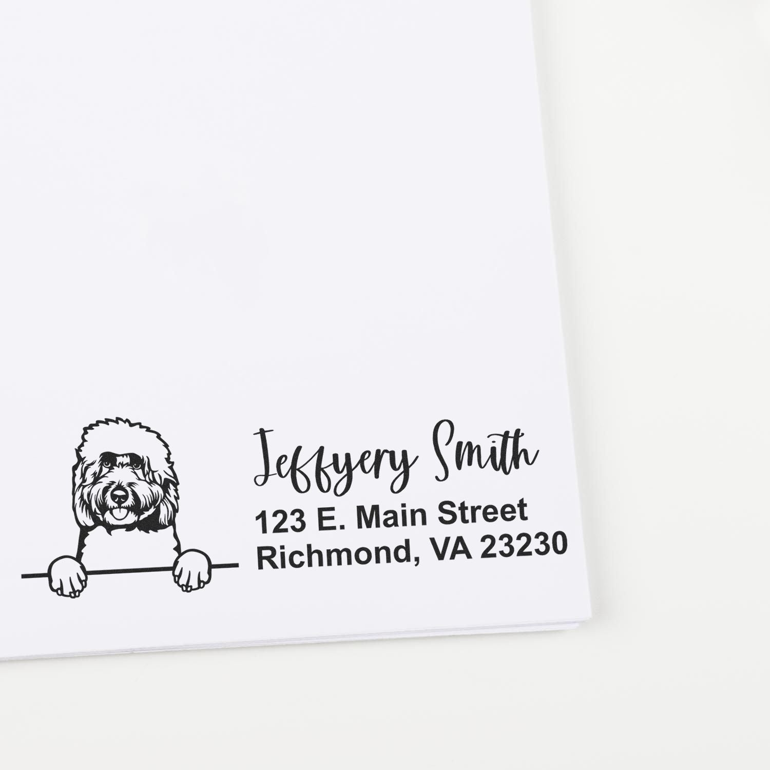 Personalized return address rubber stamp with dog illustration, name Jeffery Smith, and Richmond, VA address.