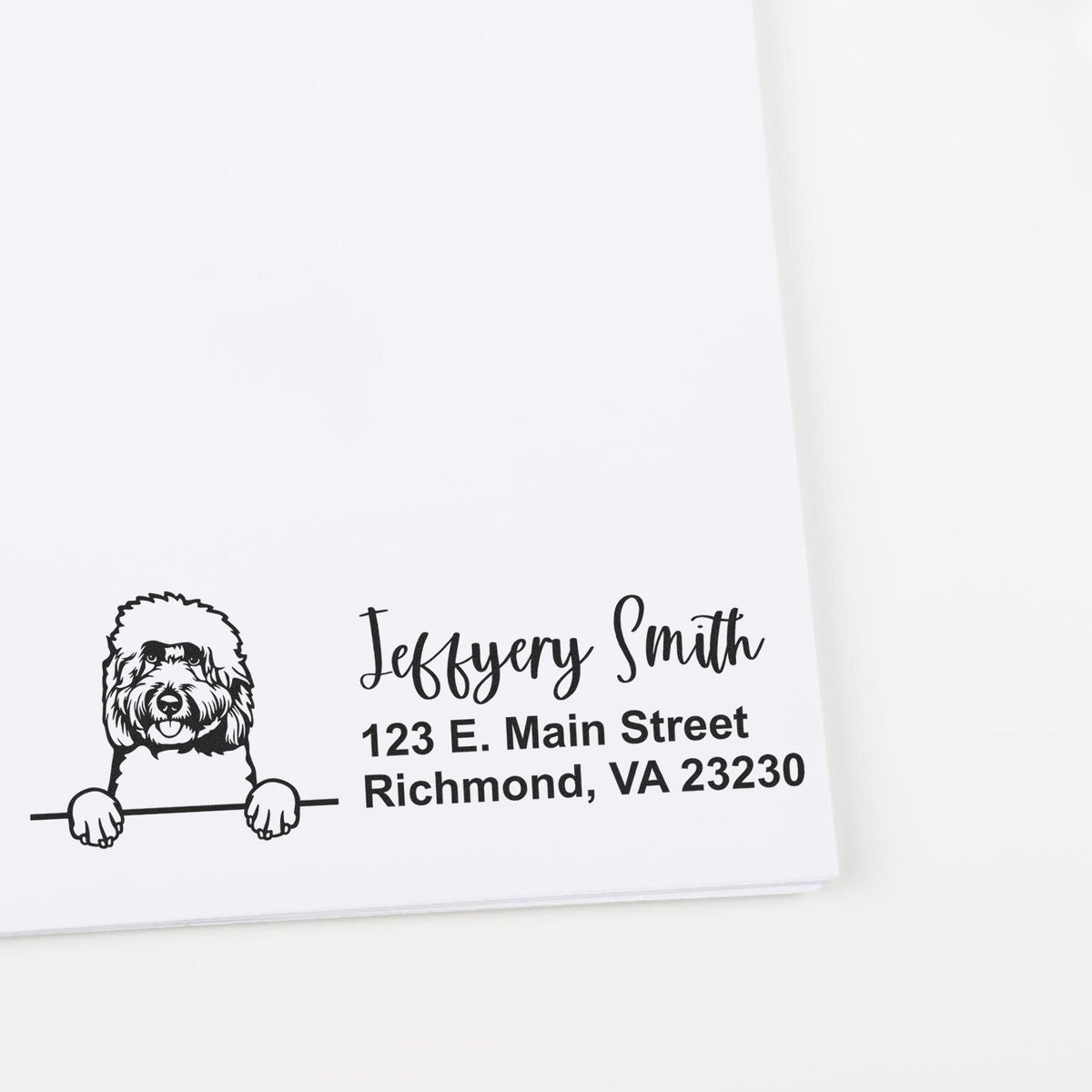 Custom dog return address rubber stamp with Jefferson Smith, 123 E. Main Street, Richmond, VA 23230.