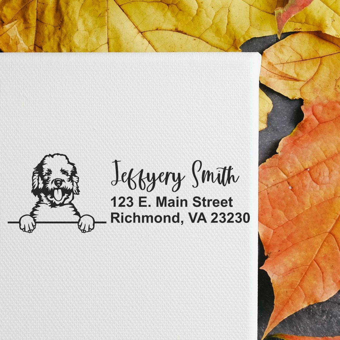 Personalized return address rubber stamp with dog illustration, Jeffery Smith, and Richmond, VA 23230 on a white card.