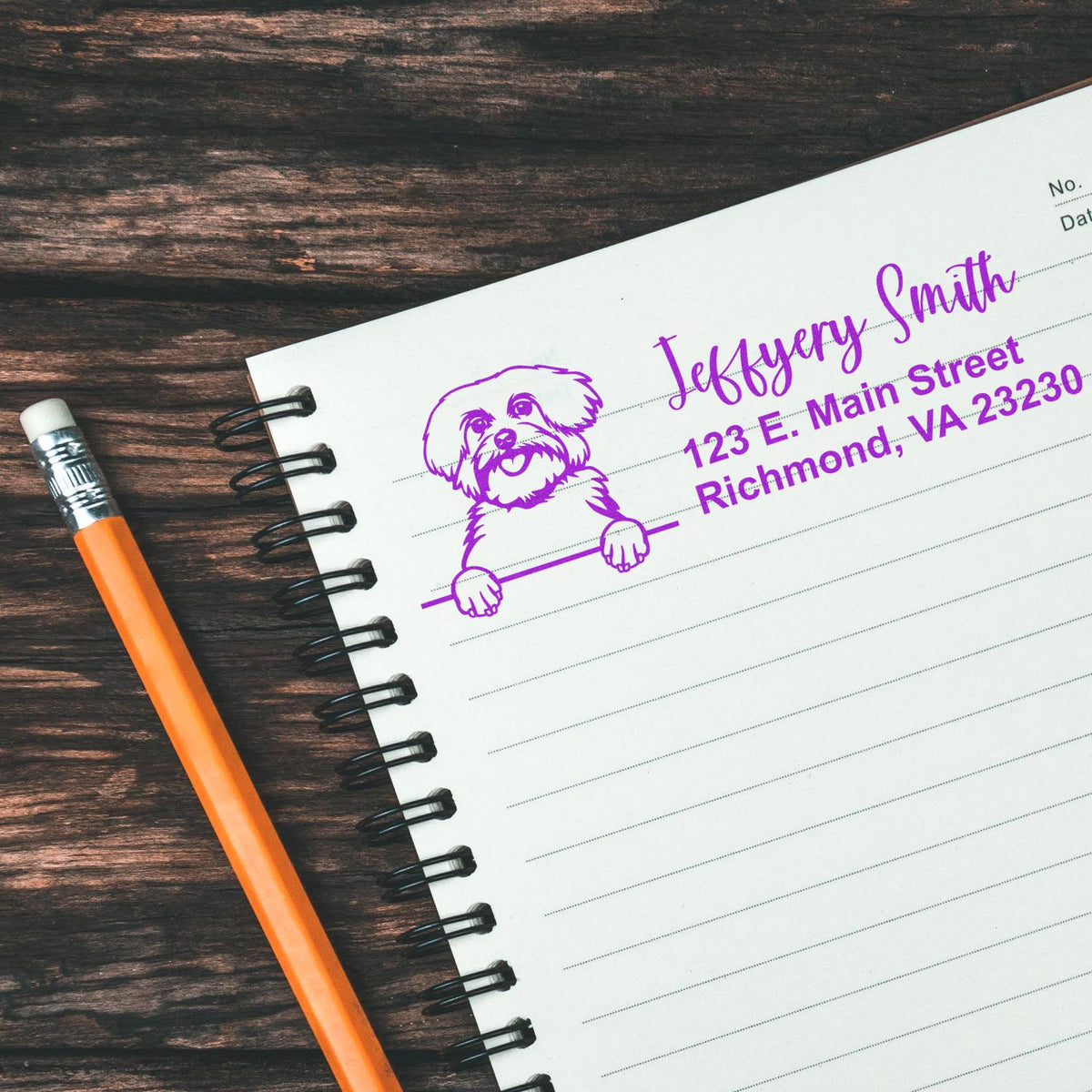 Custom dog return address rubber stamp with personalized name and Richmond, VA address on notebook paper