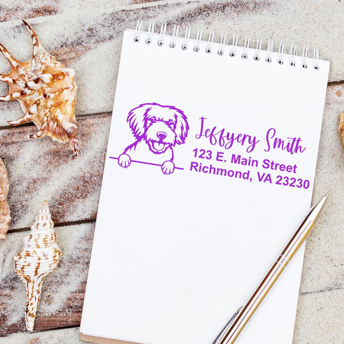 Personalized dog address rubber stamp on notebook, showing name and Richmond, VA address for mailing and packaging.