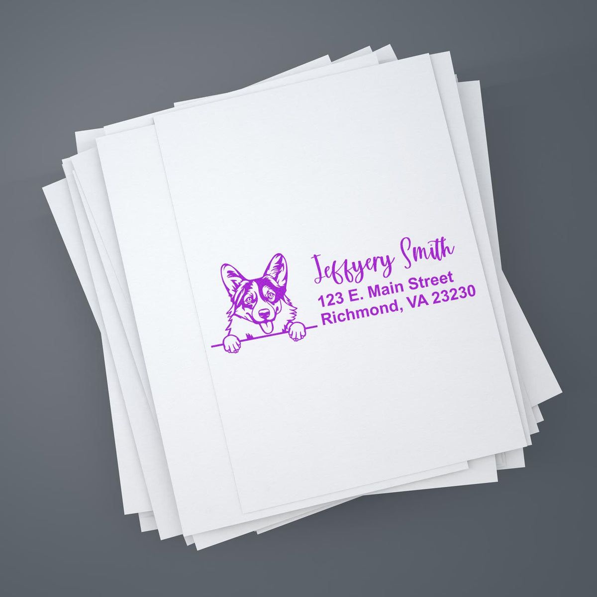 Custom purple address rubber stamp with corgi illustration for personalized mailing labels and envelopes.