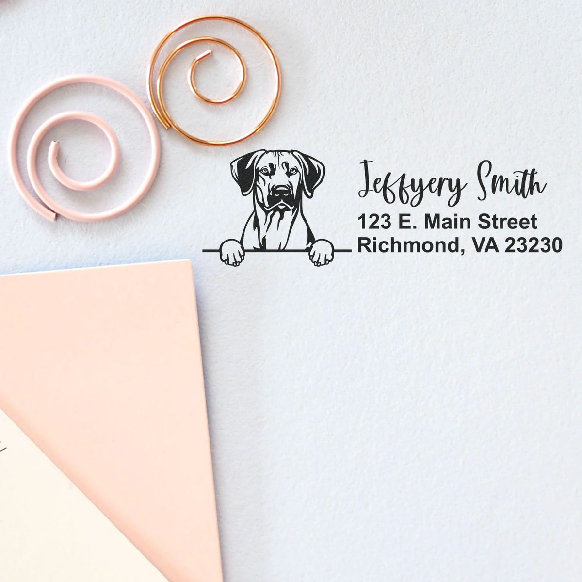 Personalized rubber address stamp with dog illustration for Jeffery Smith, featuring name and Richmond, VA return address.