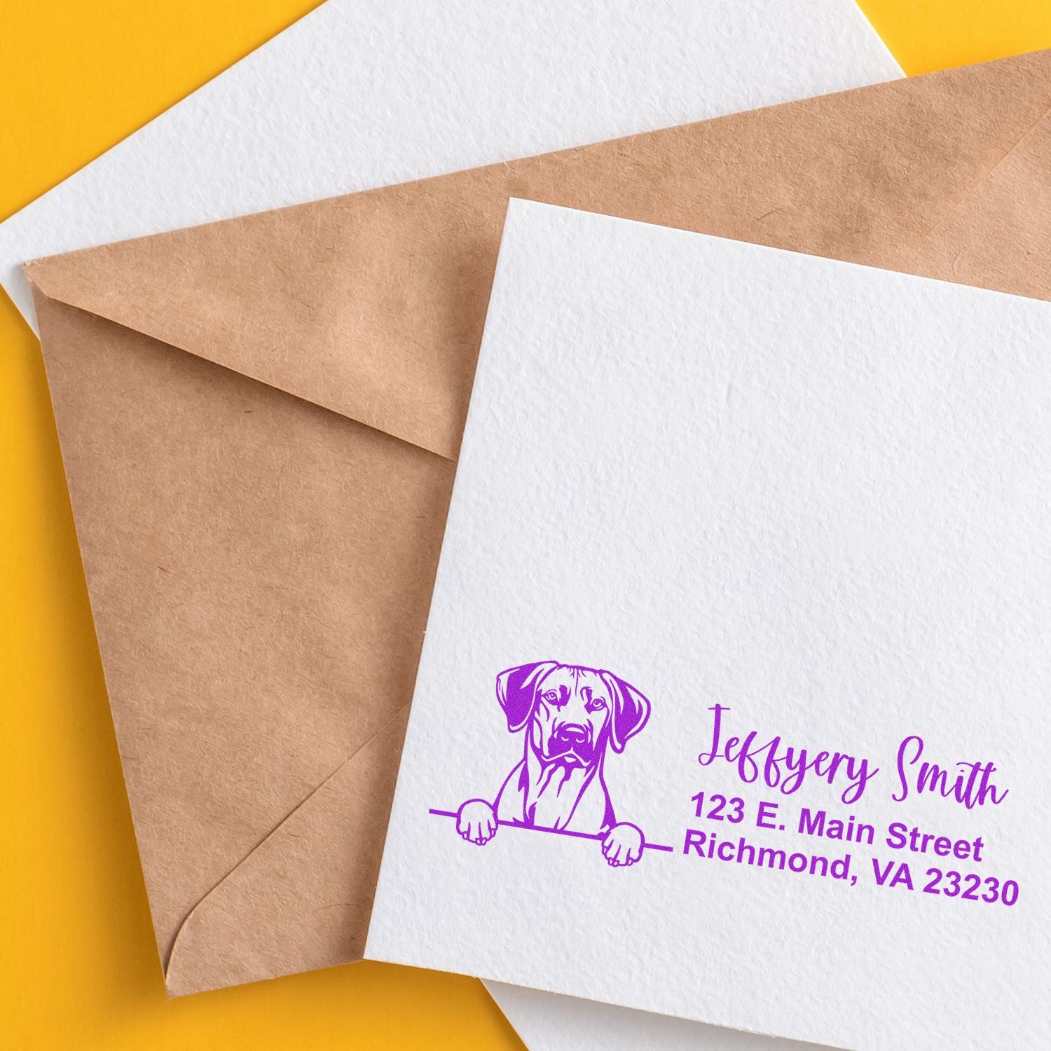 Custom dog logo return address rubber stamp on envelope for personalized pet business or home mailing.