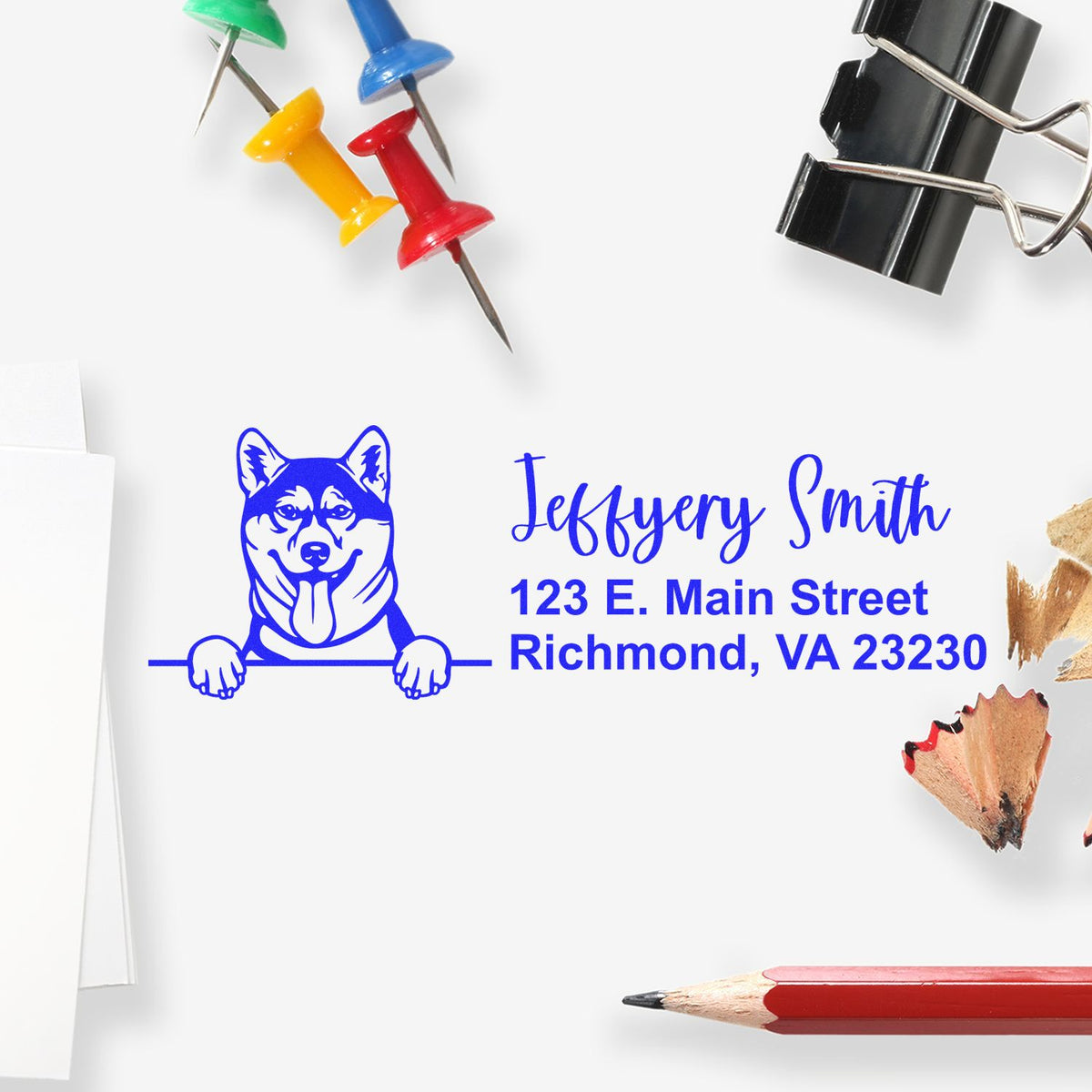 Custom rubber address stamp with dog logo and personalized return address for Jeffrey Smith, Richmond, VA 23230.