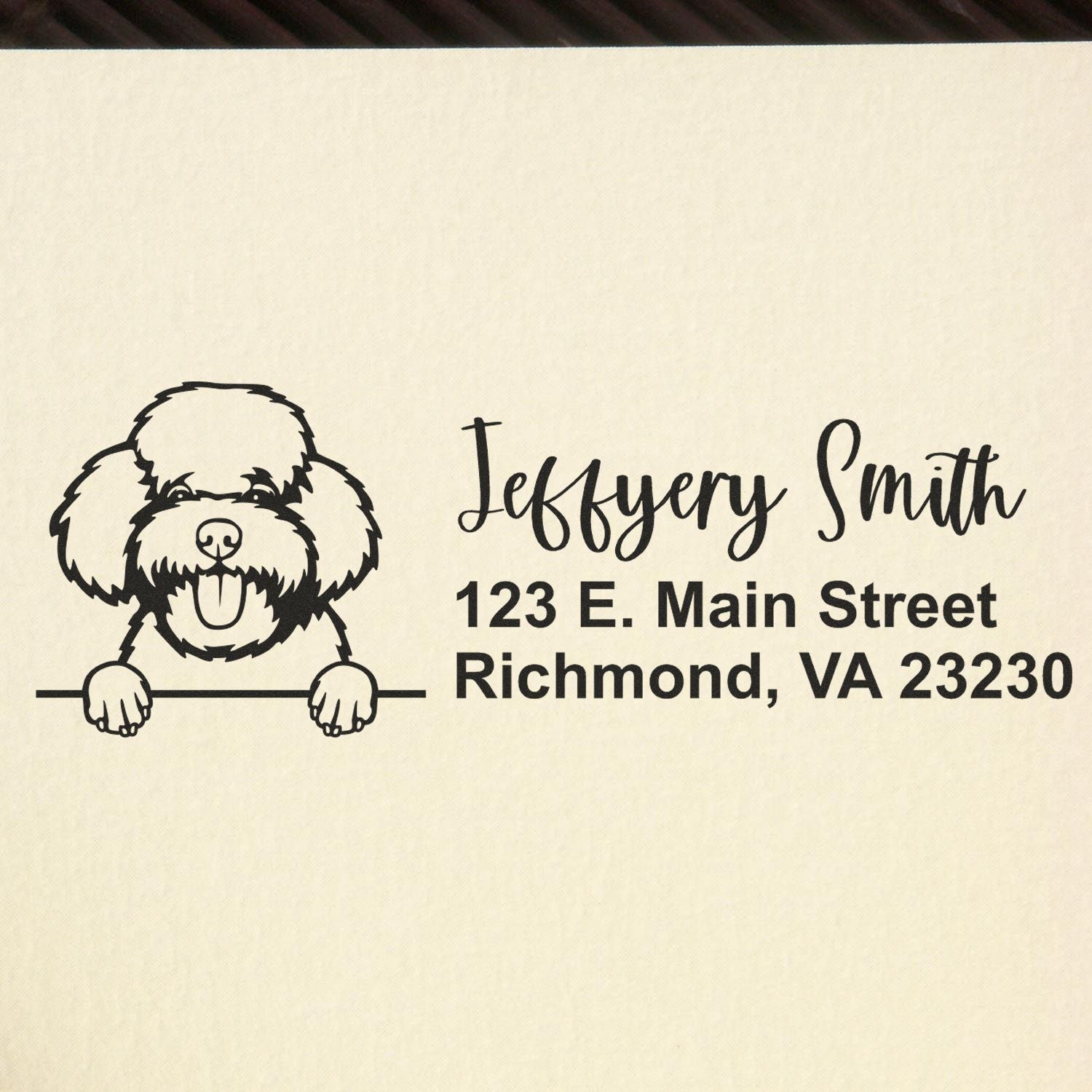 Custom rubber address stamp with dog illustration, Jeffrey Smith, 123 E. Main Street, Richmond, VA 23230.