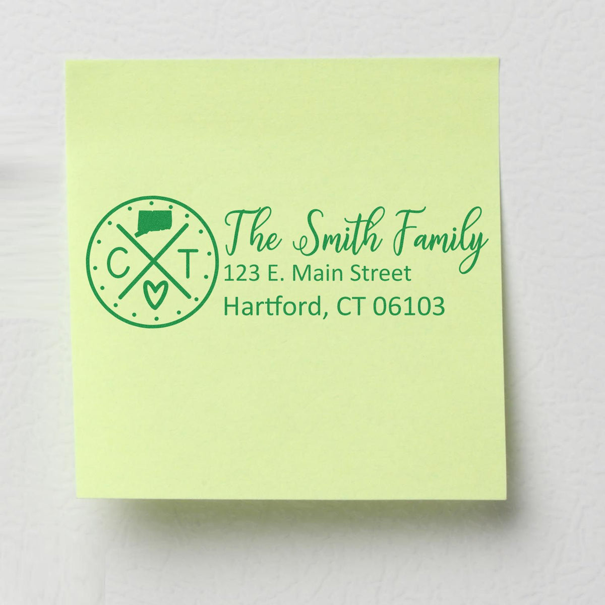 Custom rubber address stamp for The Smith Family, Hartford, CT 06103, featuring a monogram logo.