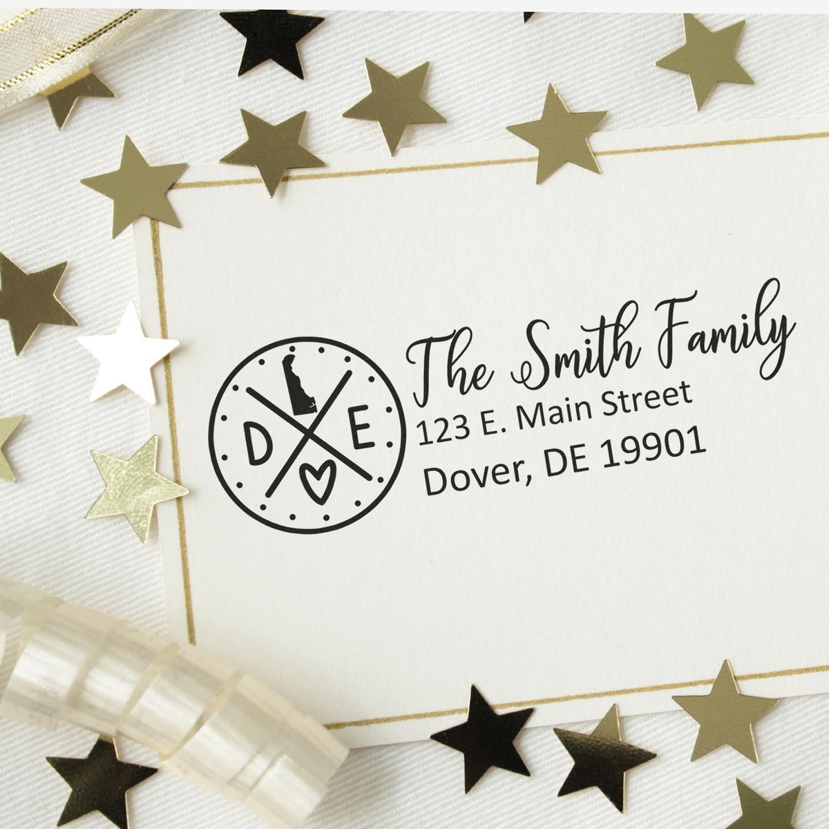 Personalized return address rubber stamp for family invitations, featuring name, street address, and gold star confetti.