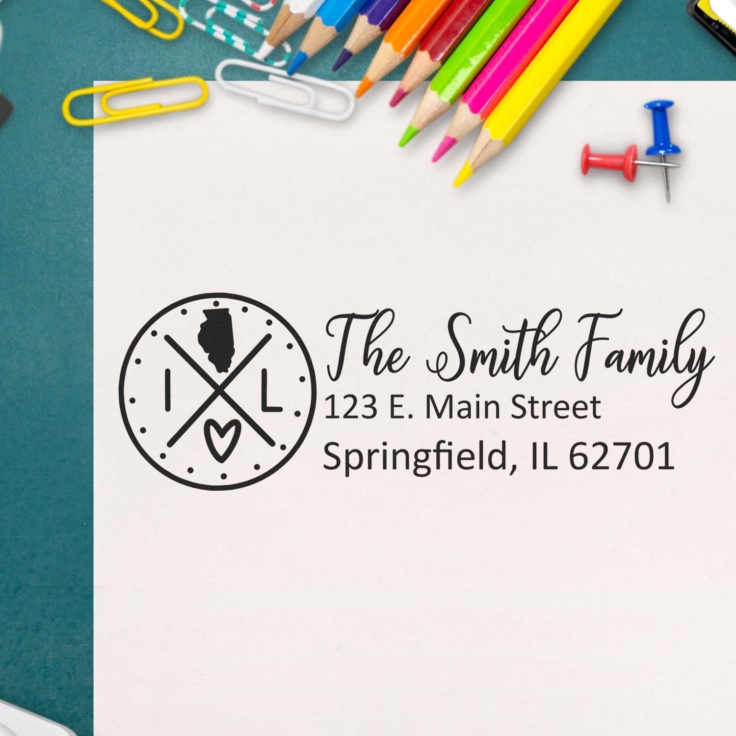 Custom rubber address stamp for The Smith Family with logo, 123 E. Main Street, Springfield, IL 62701